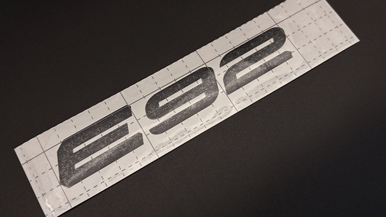 BMW E92 M3 decal lettering close-up, full view