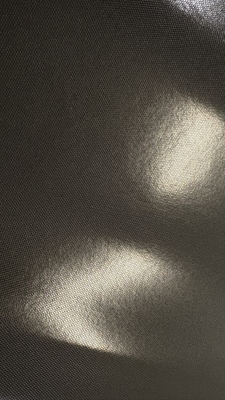 Automotive Grade Wrap Vinyl - e.g., Avery Dennison (Image 2):
  The adhesive backing features a fine grid/dot pattern with built-in air-release channels (often referred to as *Air Egress* technology). This specialized texture allows trapped air bubbles to escape easily during application, ensuring a smooth finish. Additionally, it is designed for clean removal without leaving sticky adhesive residue behind.