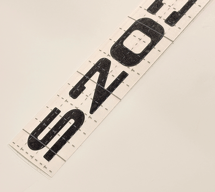 Close-up of Mercedes S203 decal upright letter style